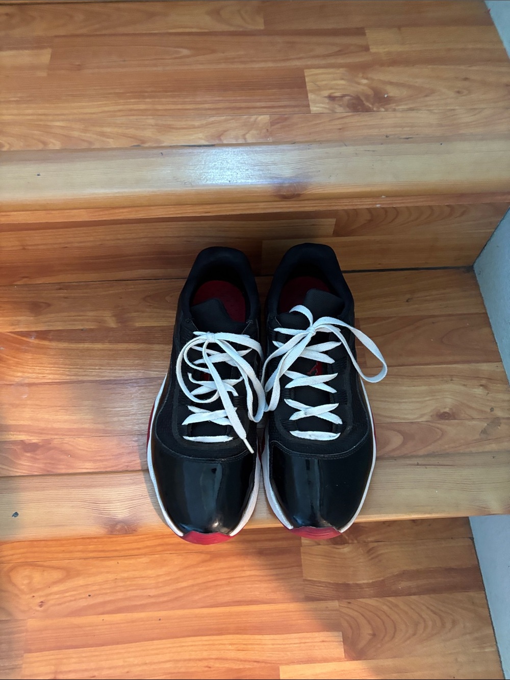 Jordan Men's Black Sneakers with White Laces and Red Accents